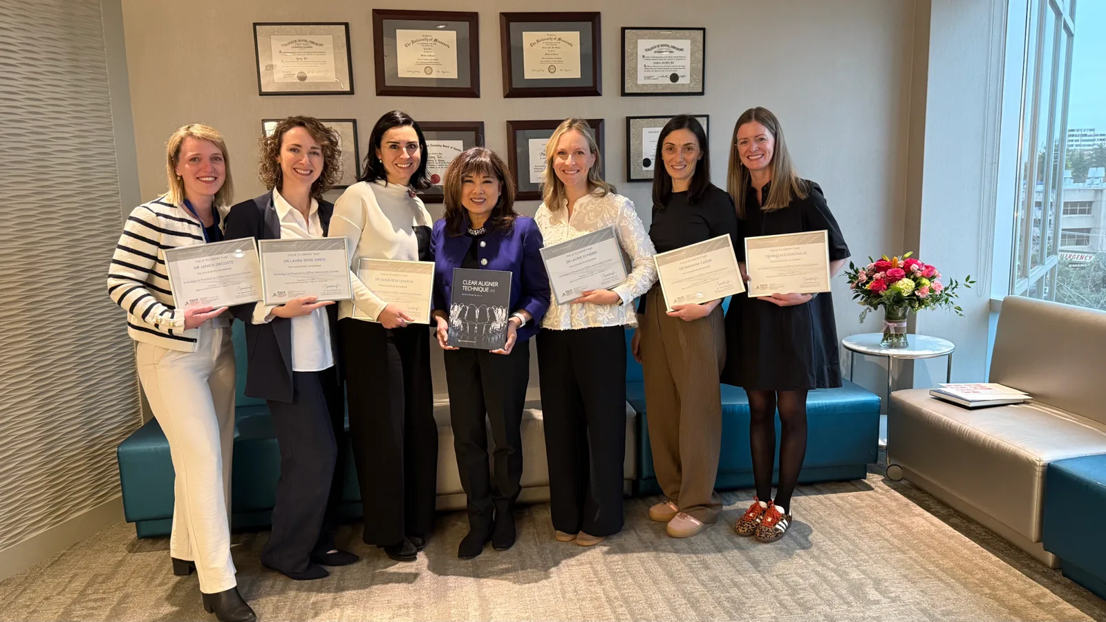 Invisalign In-Practice Immersion graduates with their certificates